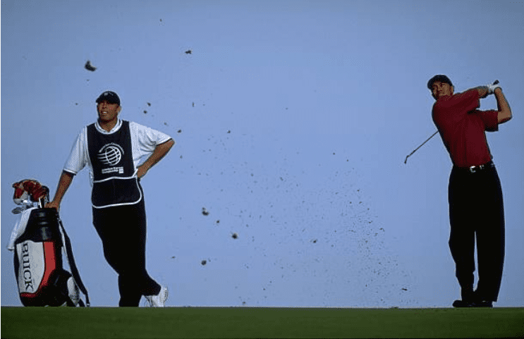 Tiger and caddie keep eyes on the ball - AMEX