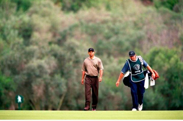 Tiger walking with the caddie - AMEX